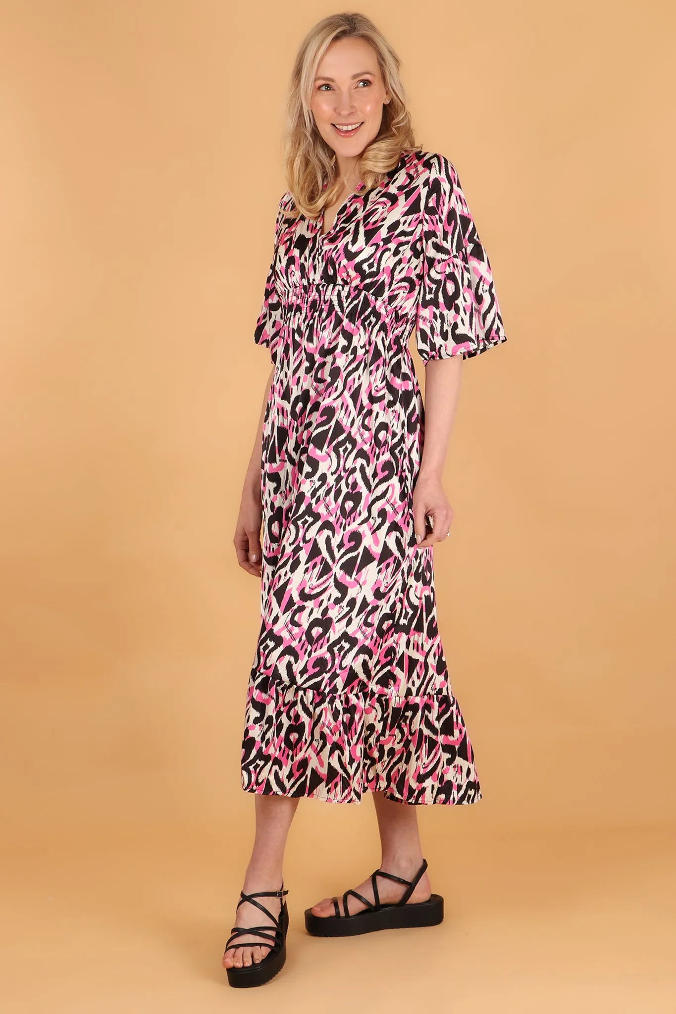 Abstract Ikat Print V-Neck Fluted Sleeve Shirred Maxi Dress in Pink