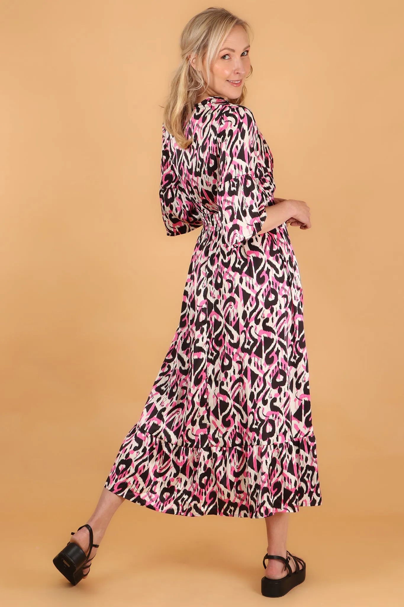 Abstract Ikat Print V-Neck Fluted Sleeve Shirred Maxi Dress in Pink