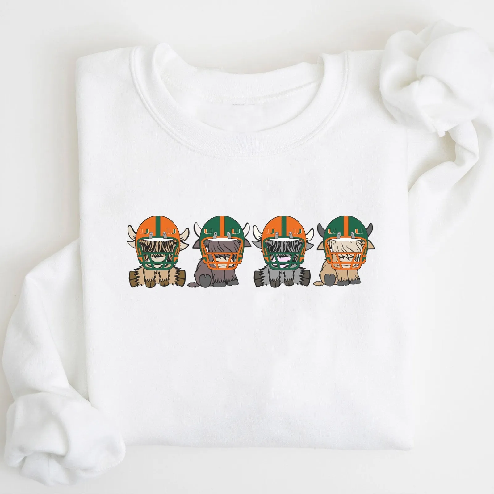 Miami Hurricanes Football Highland Cow Football Team Football Lovers Gift Unisex Crewneck Hoodie Sweatshirt