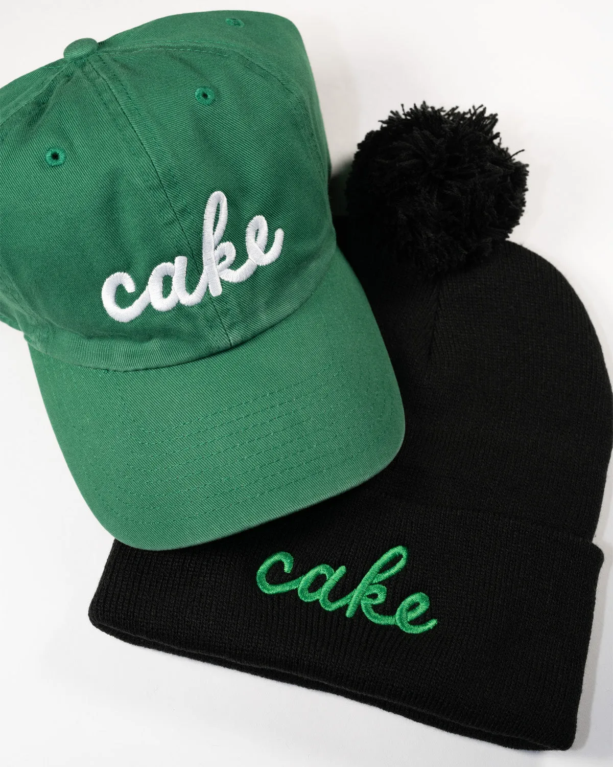 Northmade Co. Edina "Cake" Pom Hat in Black/Green